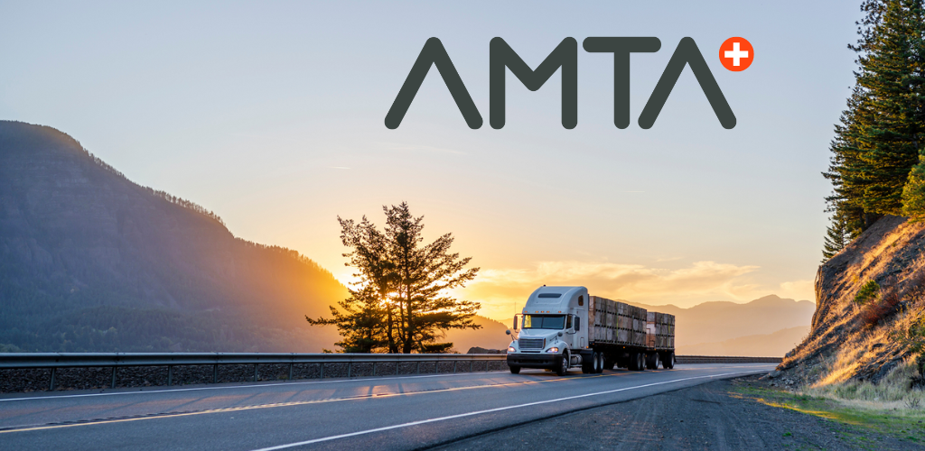 AMTA+ Banner with Semi Truck driving down mountain highway during sunset