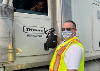 AMTA Board Chair Jude Groves handing out gift bags to commercial drivers during Driver Appreciation Days, September 2021