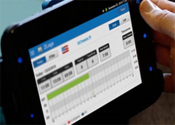 Close-up of truck driver using an ELD